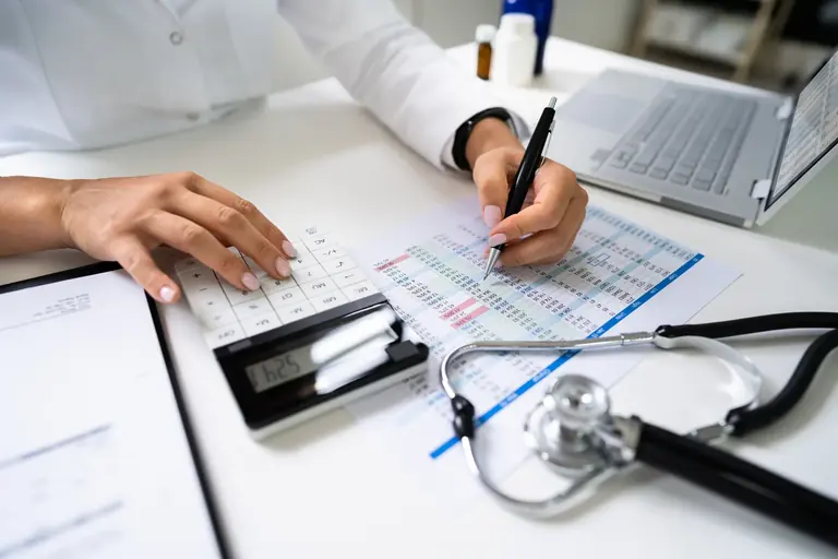 Medical billing and coding documents under review